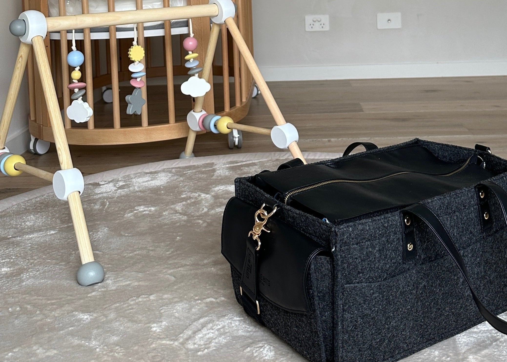 nappy caddy with lid neatly packed in nursery